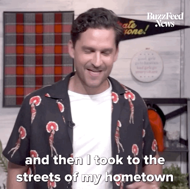 GIF of Ben Aldridge saying ''and then I took to the streets of my hometown, jumping around, being Catman''