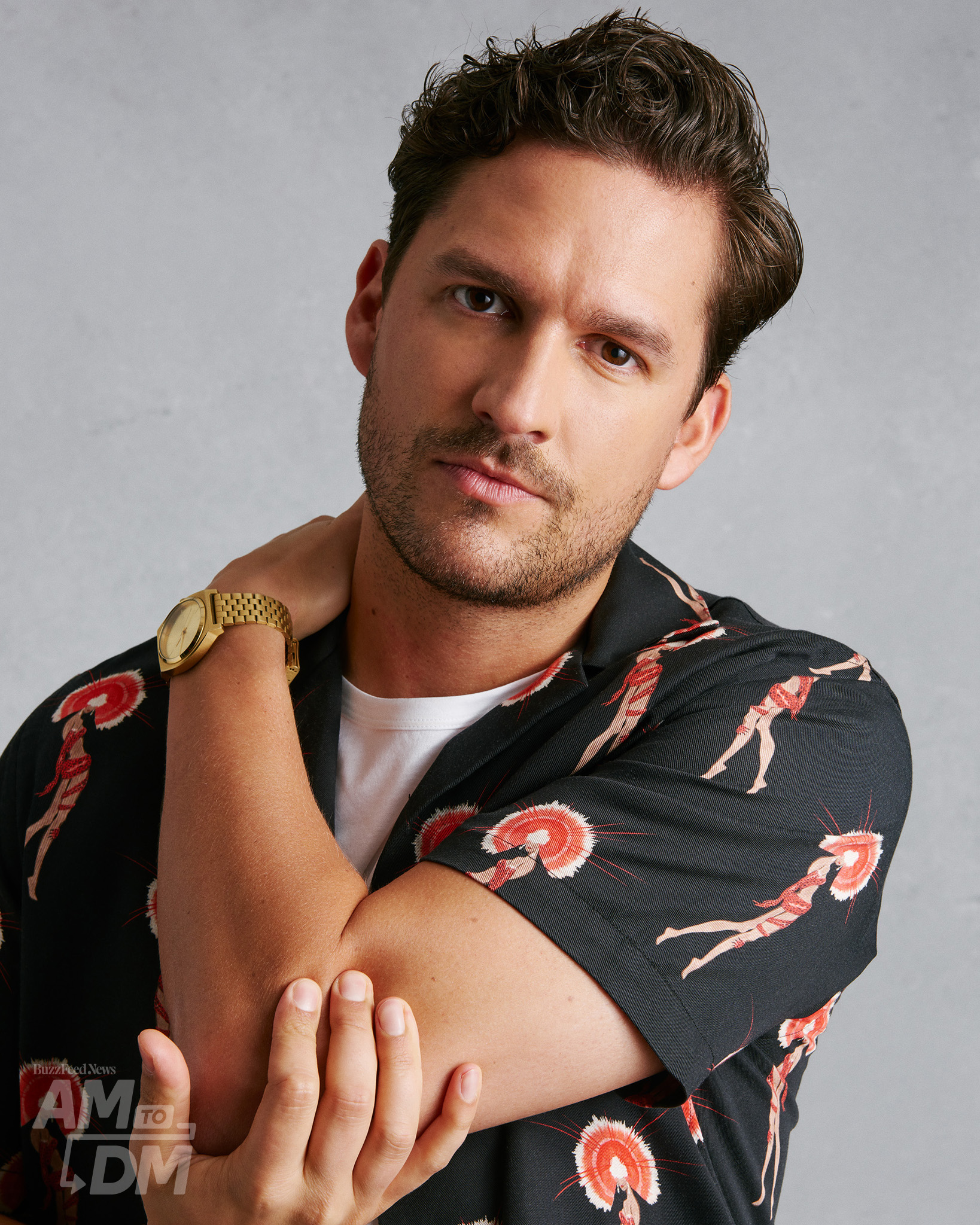 Portrait of Ben Aldridge wearing a black button down over a white t-shirt in front of a light gray background. CREDIT: JJ Reddington / BuzzFeed News