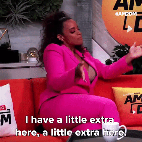 GIF of Dascha Polanco saying ''I have a little extra here, a little extra here. I feel good! So don't knock that! Don't take that away from me.''