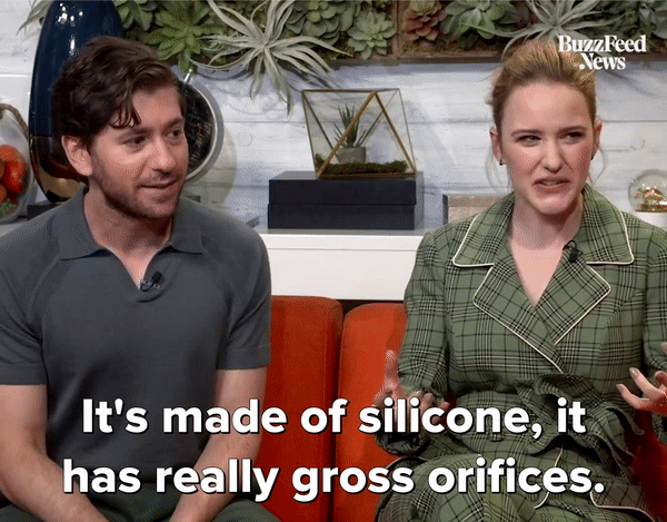GIF of Rachel Brosnahan saying ''It's made of silicone, it has really gross orifices.'' and Michael Zegen saying ''It's sticky... it's sticky.'' GIF of Rachel Brosnahan saying ''It's made of silicone, it has really gross orifices.'' and Michael Zegen saying ''It's sticky... it's sticky.''